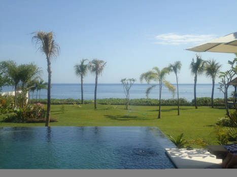 Bali - Relaxen in de tuin van  Villa Mari Masuk te Serrit