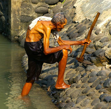 Java - Landbewerker neemt een bad.