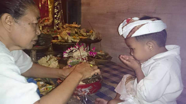 Bali - little boy praying