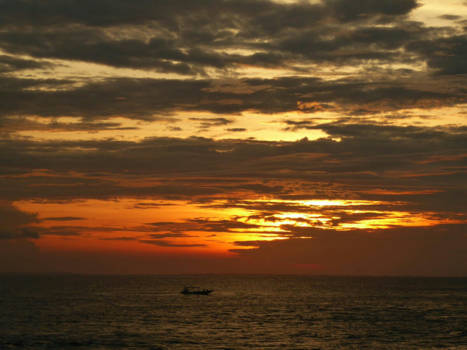 Bali - Beautiful sunset with a lovely little boat