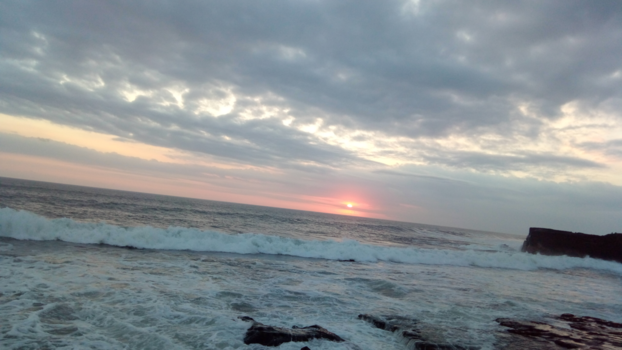 Rondreis Indonesië in vier weken - Zonsondergang bij tanah lot, bali