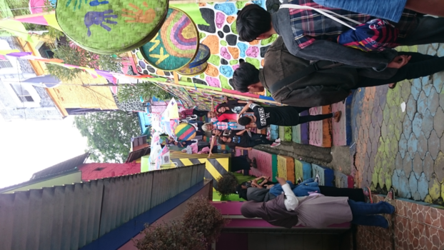 Java - Wie is hier de bezienswaardigheid in de gekleurde wijk in Malang?