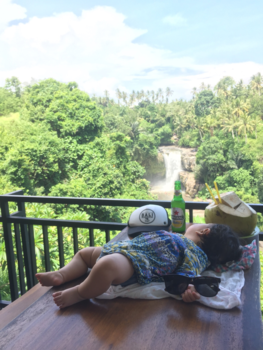 Bali - Bali survival package: Sunglasses, cap, coconut, bintang and a baby :)