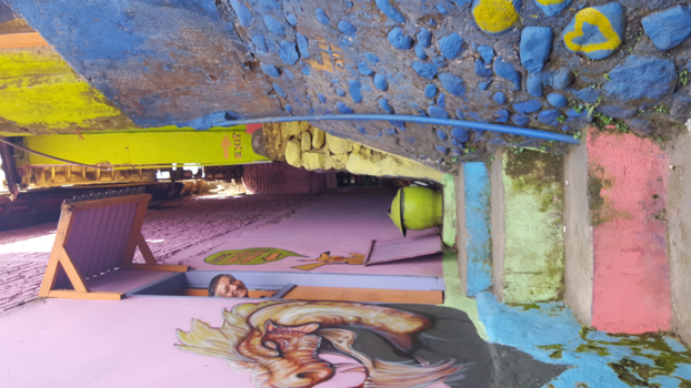 Rondreis Bali & Java - Kampung warna warni. Een prachtig kleurrijk hulpproject in Malang.